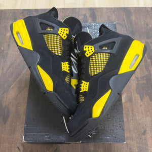 Jordan 4 Retro Thunder (2023) - Image 1