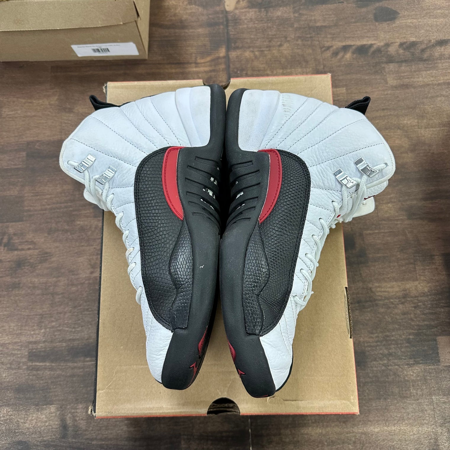 Taxi Flip Jordan 12 Retro (USED)