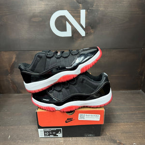 Jordan 11 Retro Low Bred (2025) - Image 1