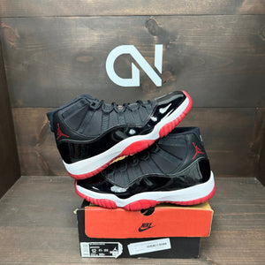 Jordan 11 Retro Playoffs Bred (2019) - Image 1