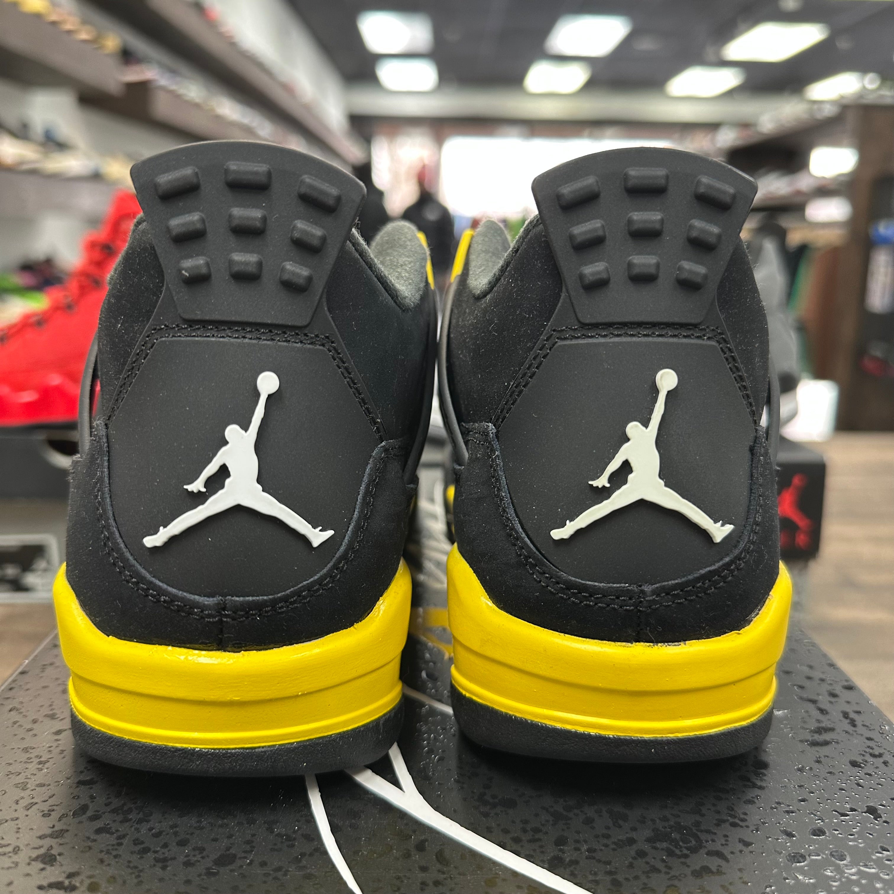 Jordan 4 Retro Thunder (2023) (Grade school) (US 5.5Y) (Lightly Worn) Size 5.5Y (Pre-Owned) - Image 4