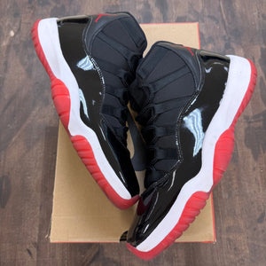 Jordan 11 Retro Playoffs Bred (2019) - Image 1