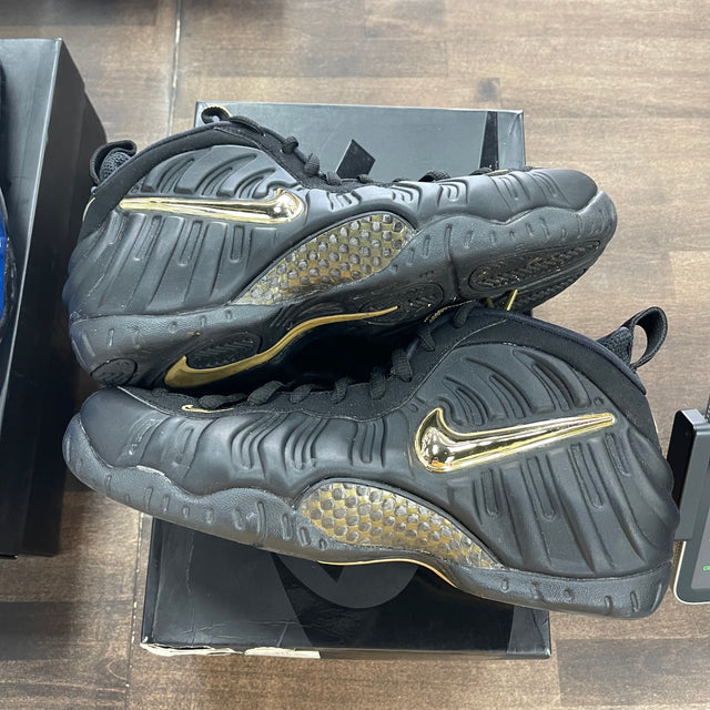 Black Metallic Gold Foamposite Pro (USED)