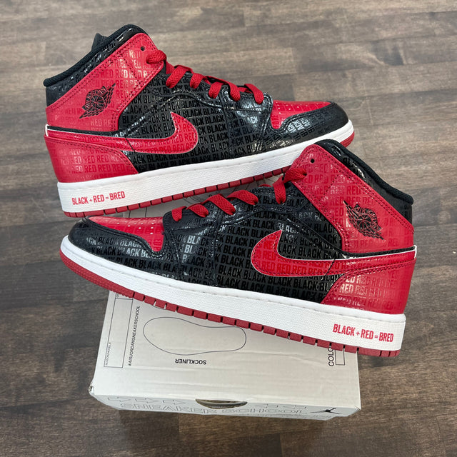 (GS) Bred Text Jordan 1 Mid (USED)