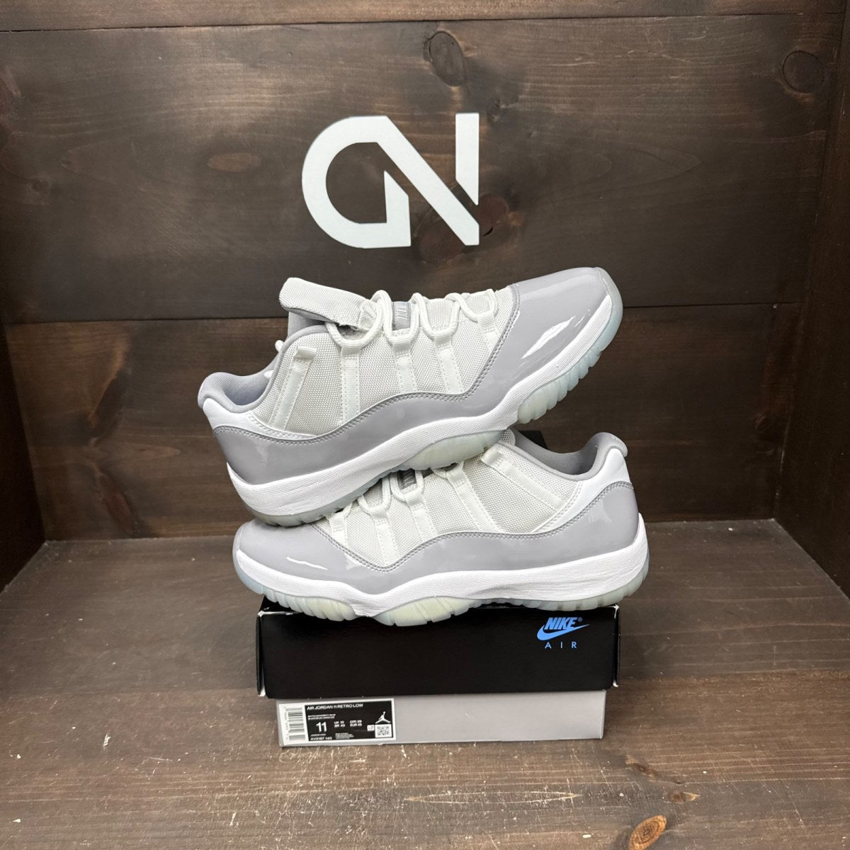 Jordan 11 Retro Low Cement Grey - Image 1
