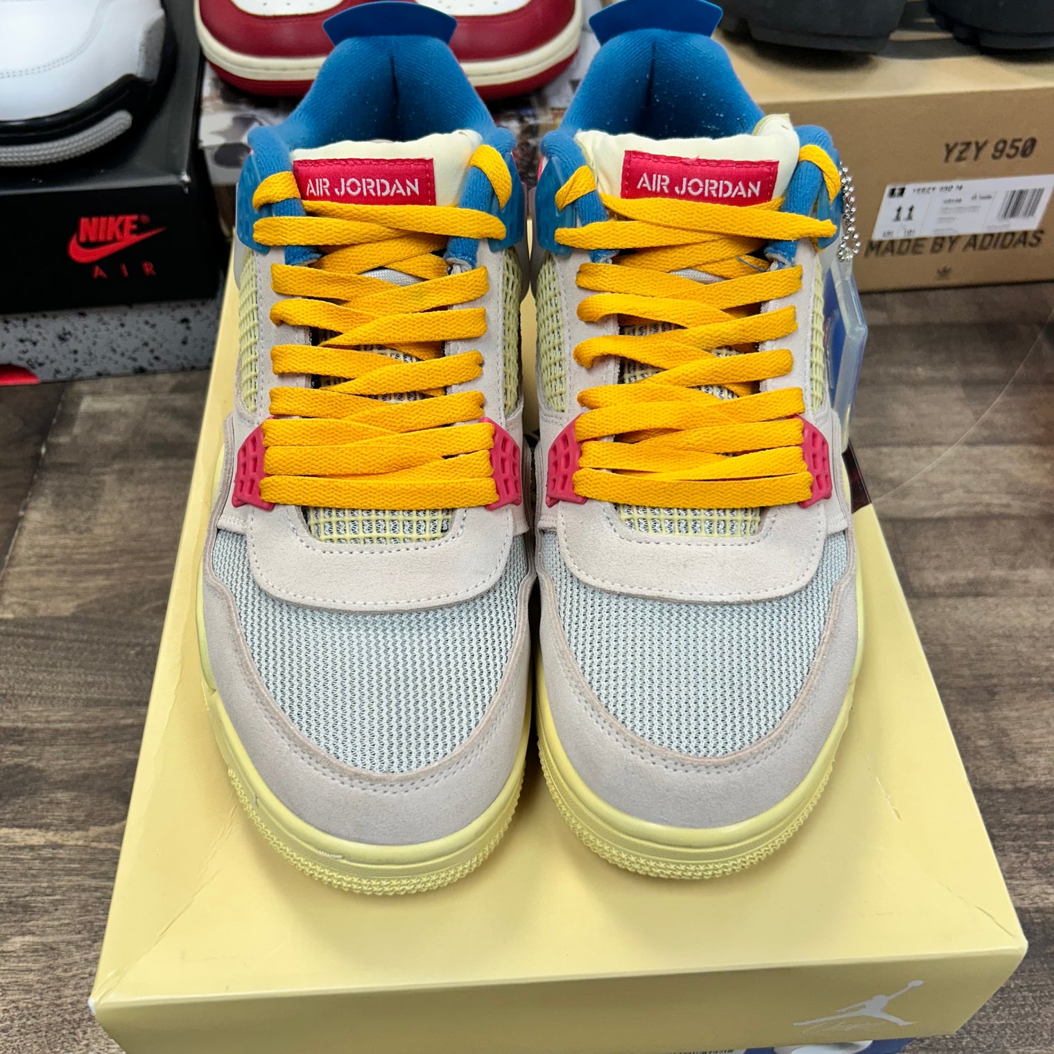 Union Guava Ice Jordan 4 Retro (USED)