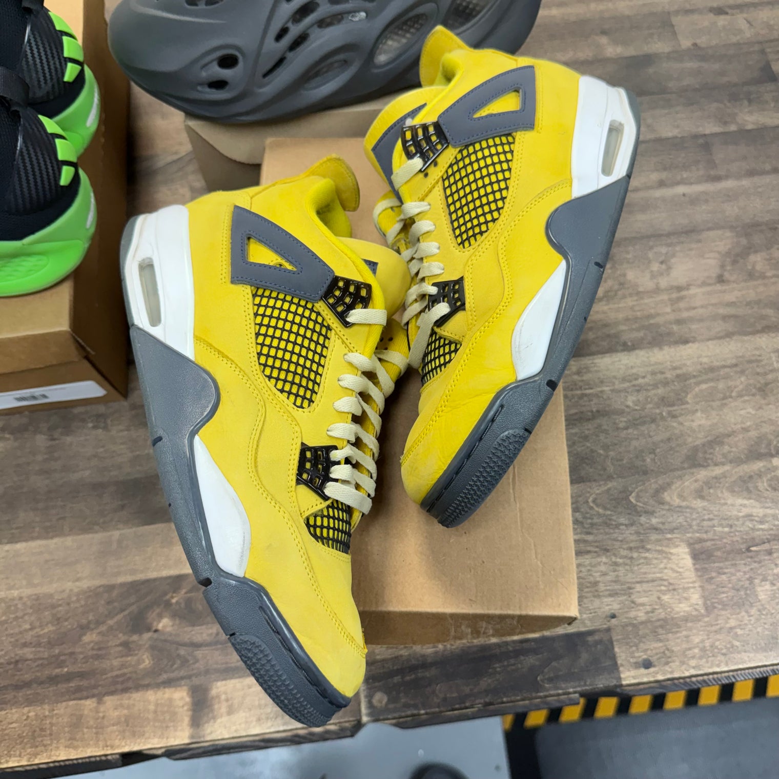 Lightning Jordan 4 Retro (USED, No Box)