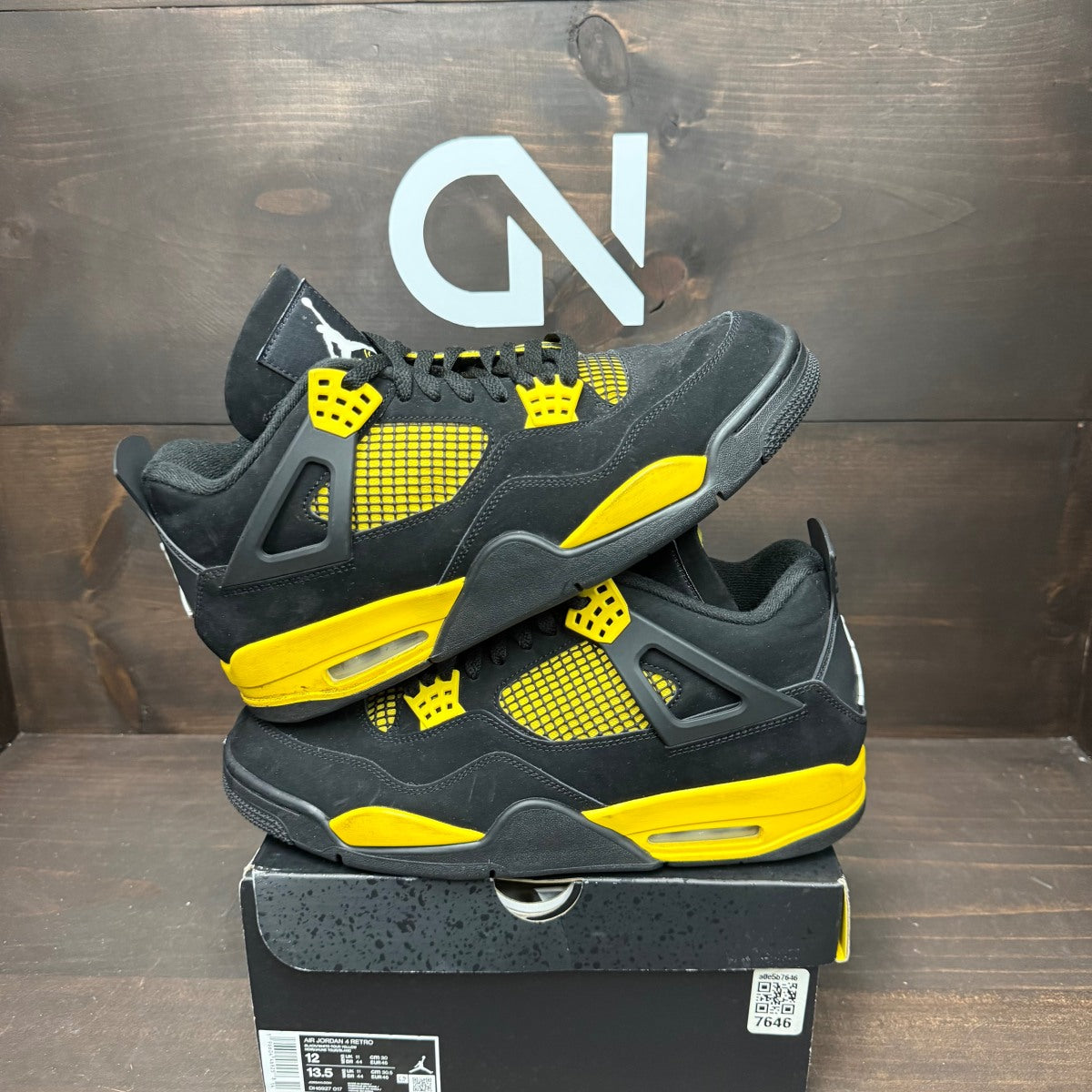 Jordan 4 Retro Thunder (2023) - Image 1
