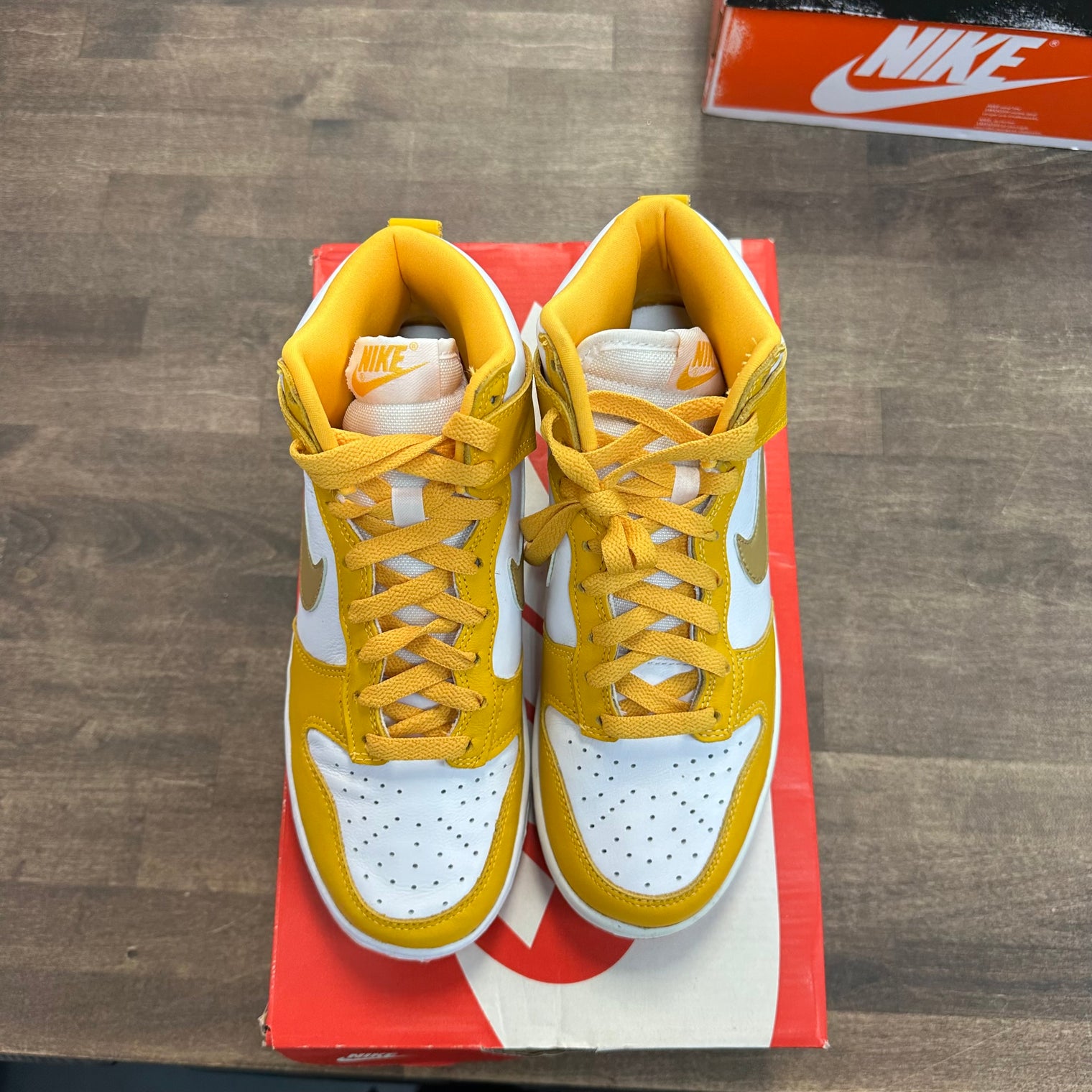 University Gold Nike Dunk High (W) (Lightly Worn)
