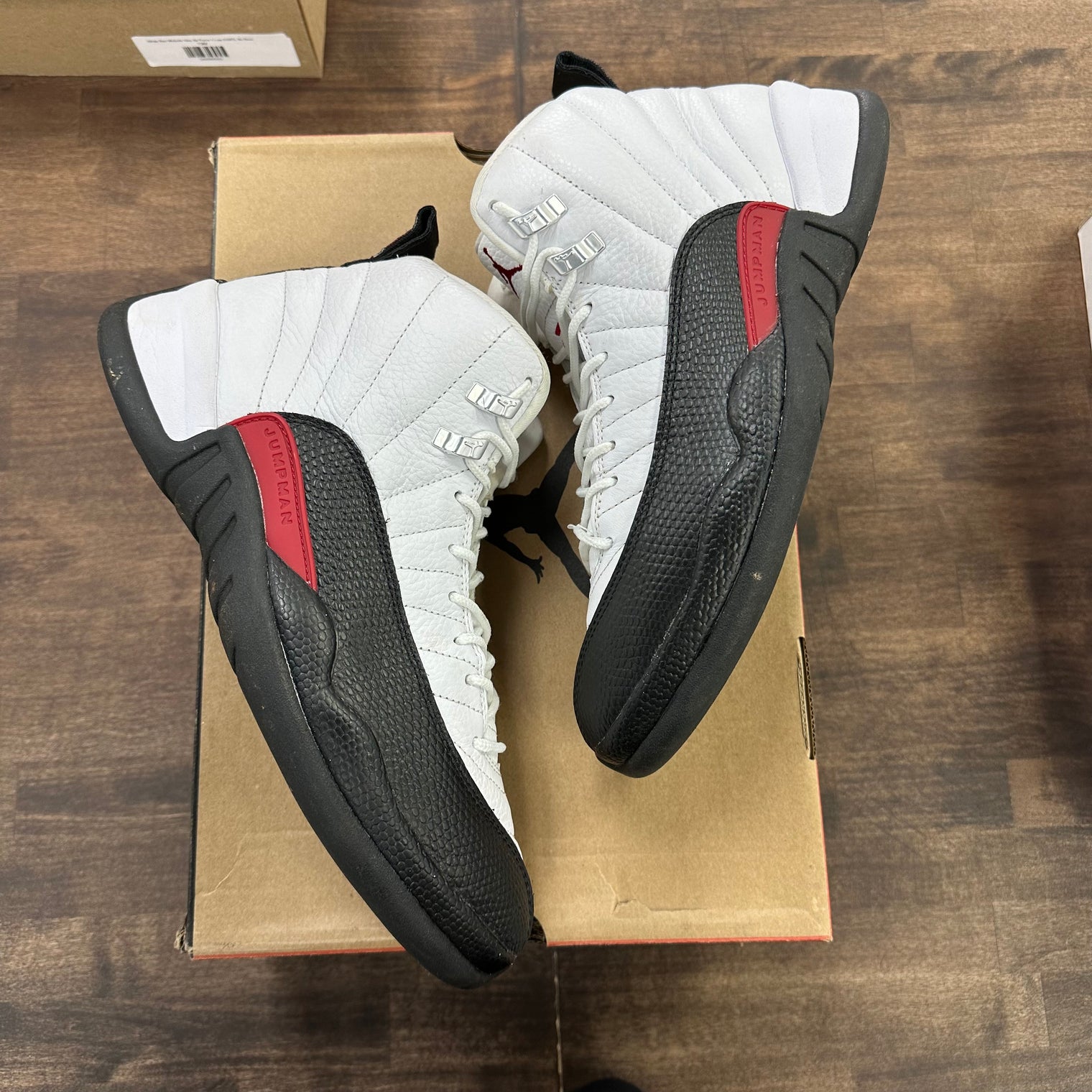 Taxi Flip Jordan 12 Retro (USED)
