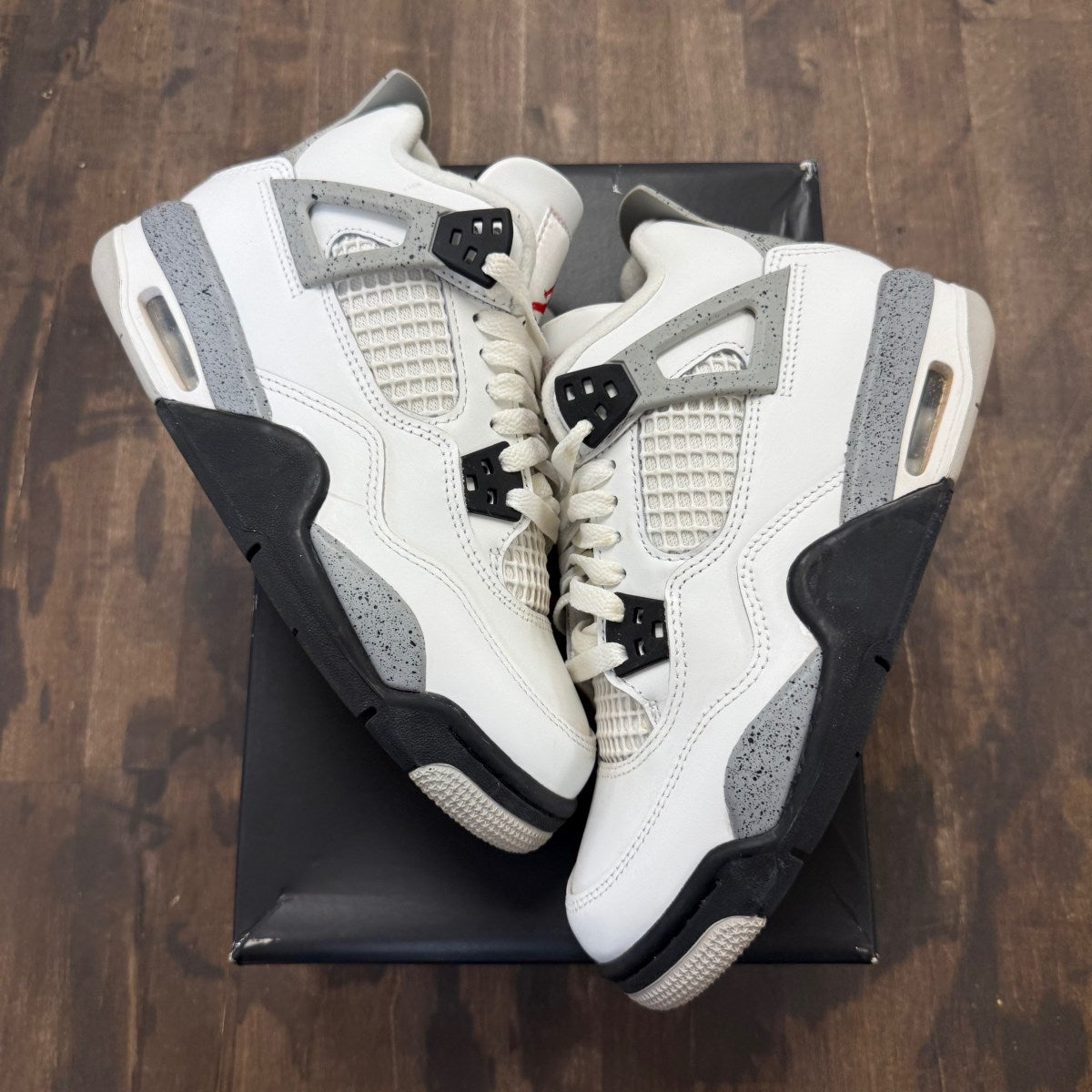 Jordan 4 Retro White Cement (2025) (GS) - Image 1