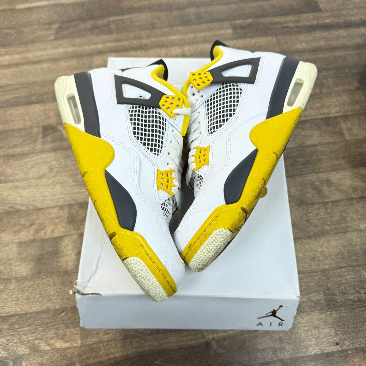 Jordan 4 Retro Vivid Sulfur (Women's) - Image 1