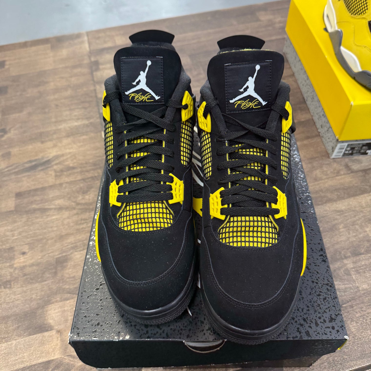 Yellow Thunder Jordan 4 (USED)