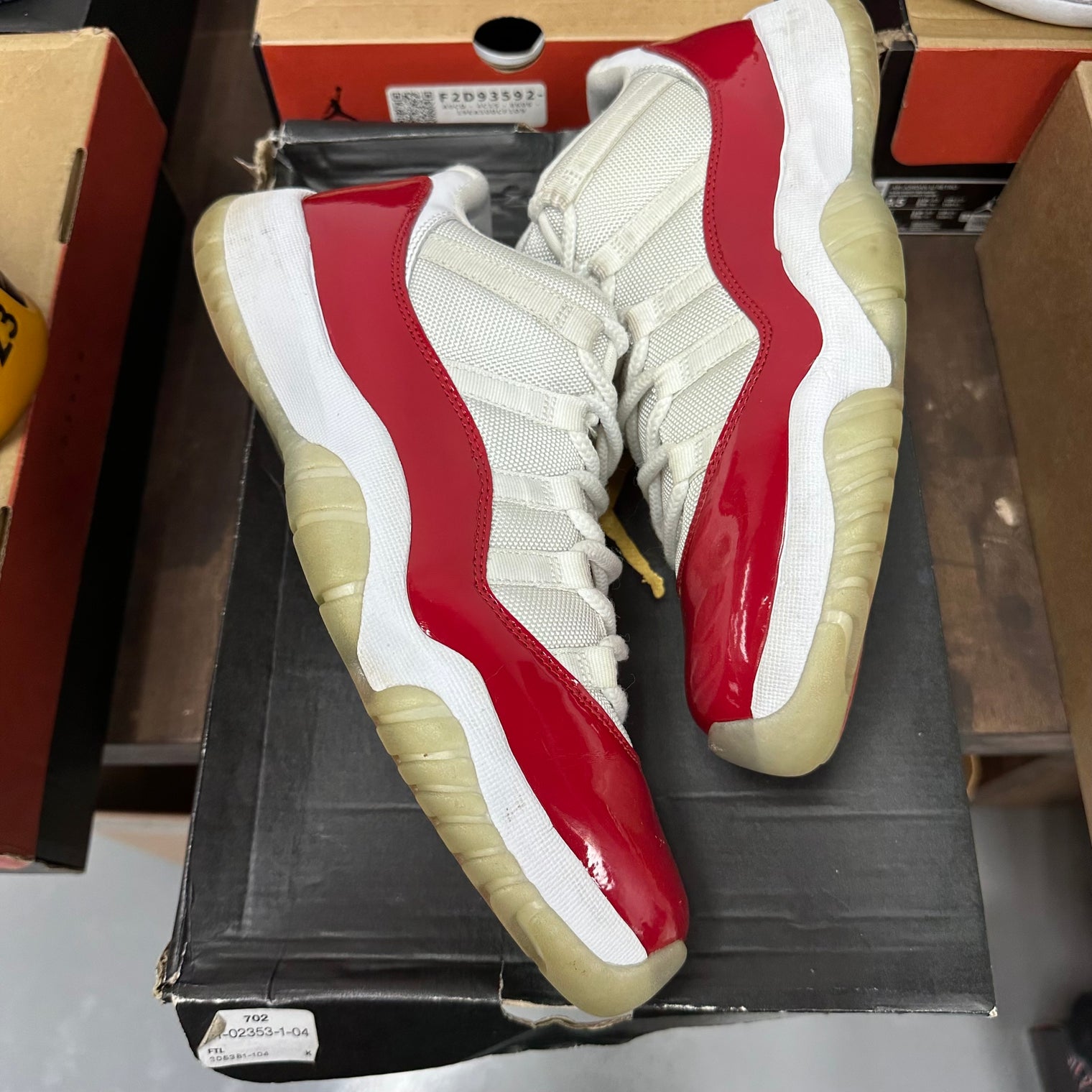 Cherry Jordan 11 Low (USED, Replacement Box)