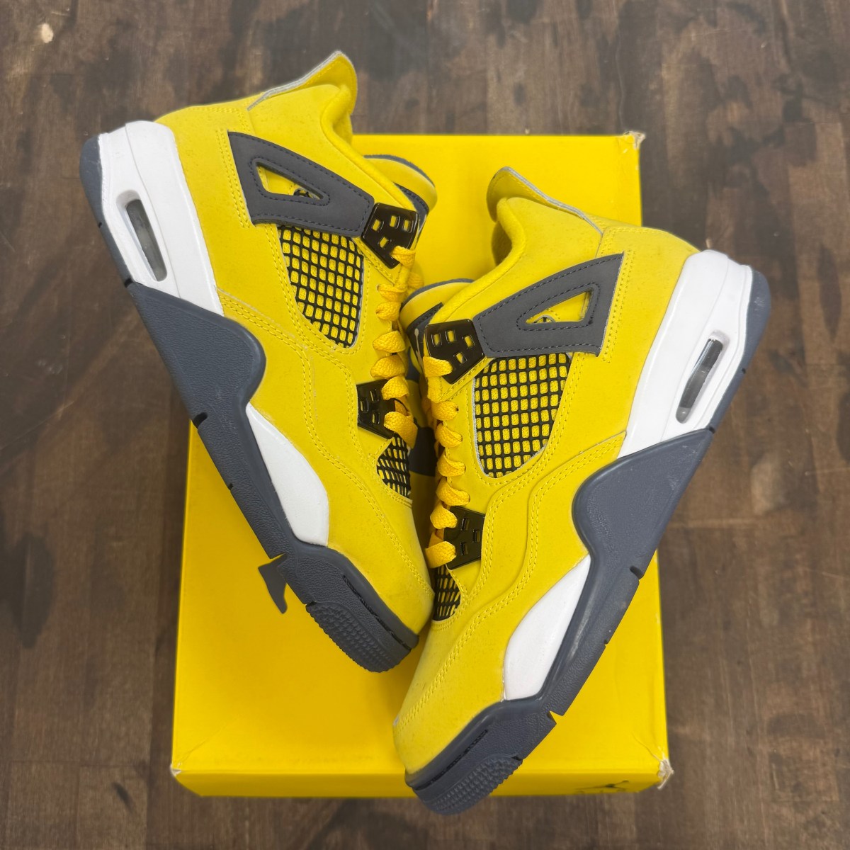 Jordan 4 Retro Lightning (2021) (GS) - Image 1