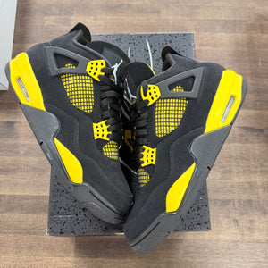 Jordan 4 Retro Thunder (2023) - Image 1
