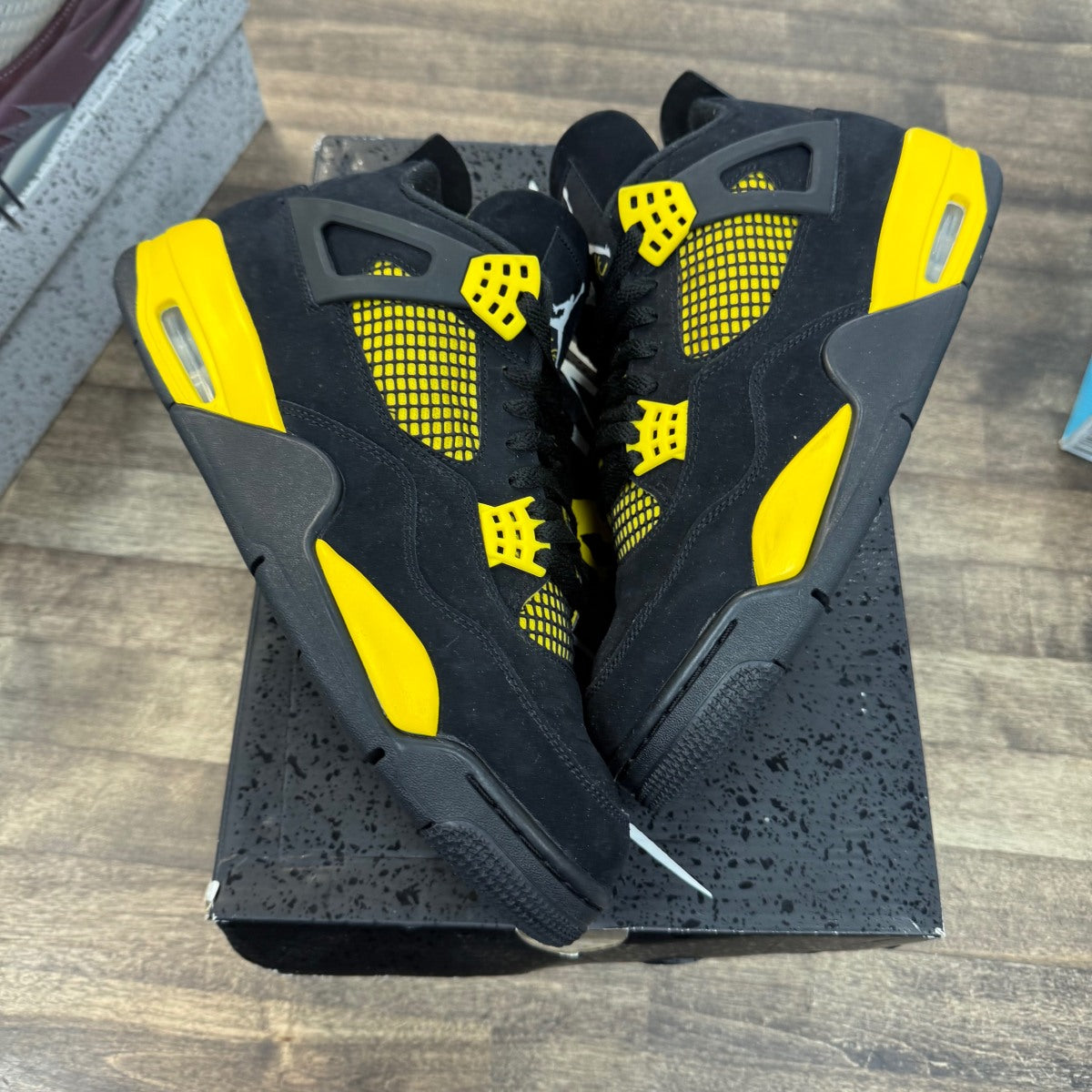 Jordan 4 Retro Thunder (2023) - Image 1