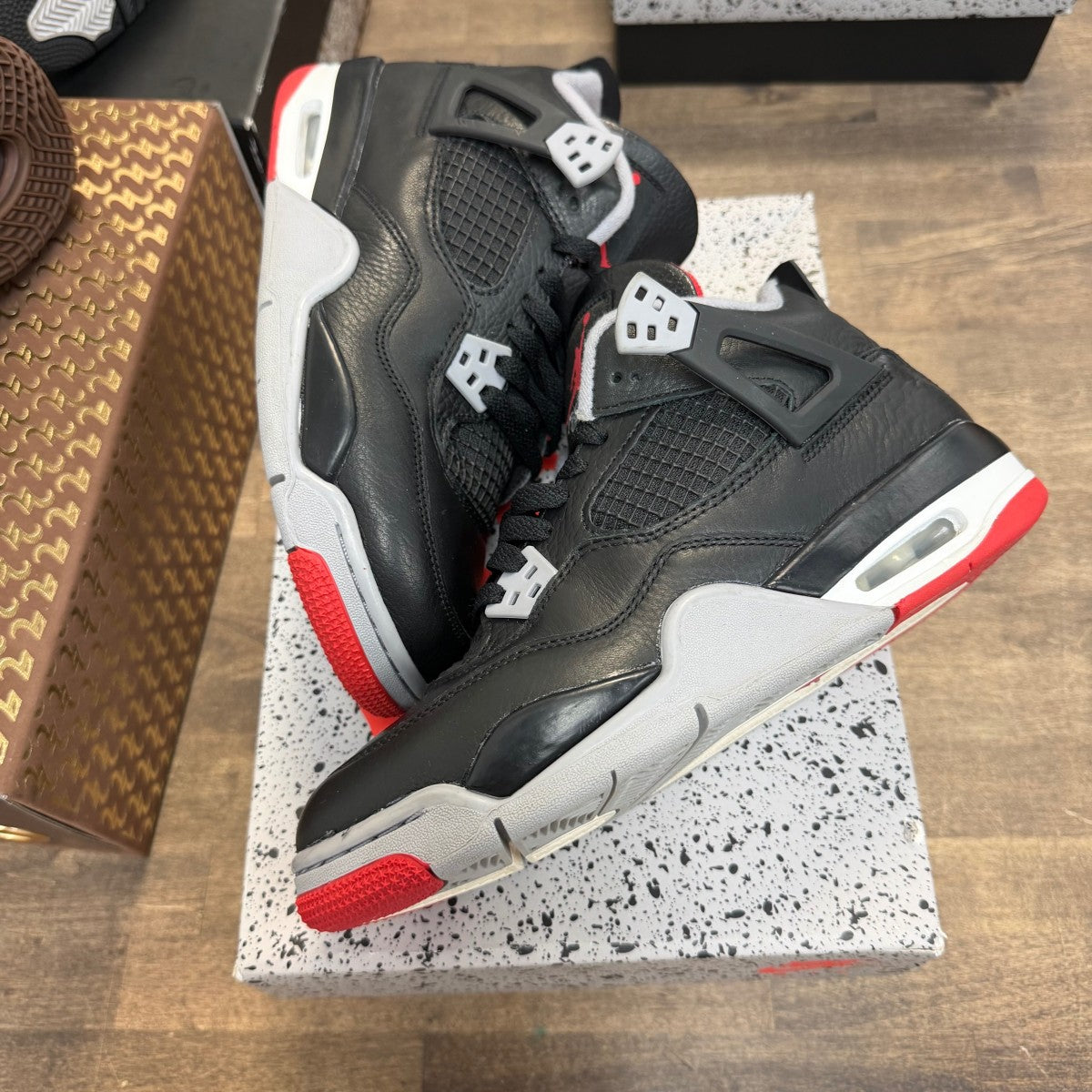Jordan 4 Retro Bred Reimagined (GS) - Image 1
