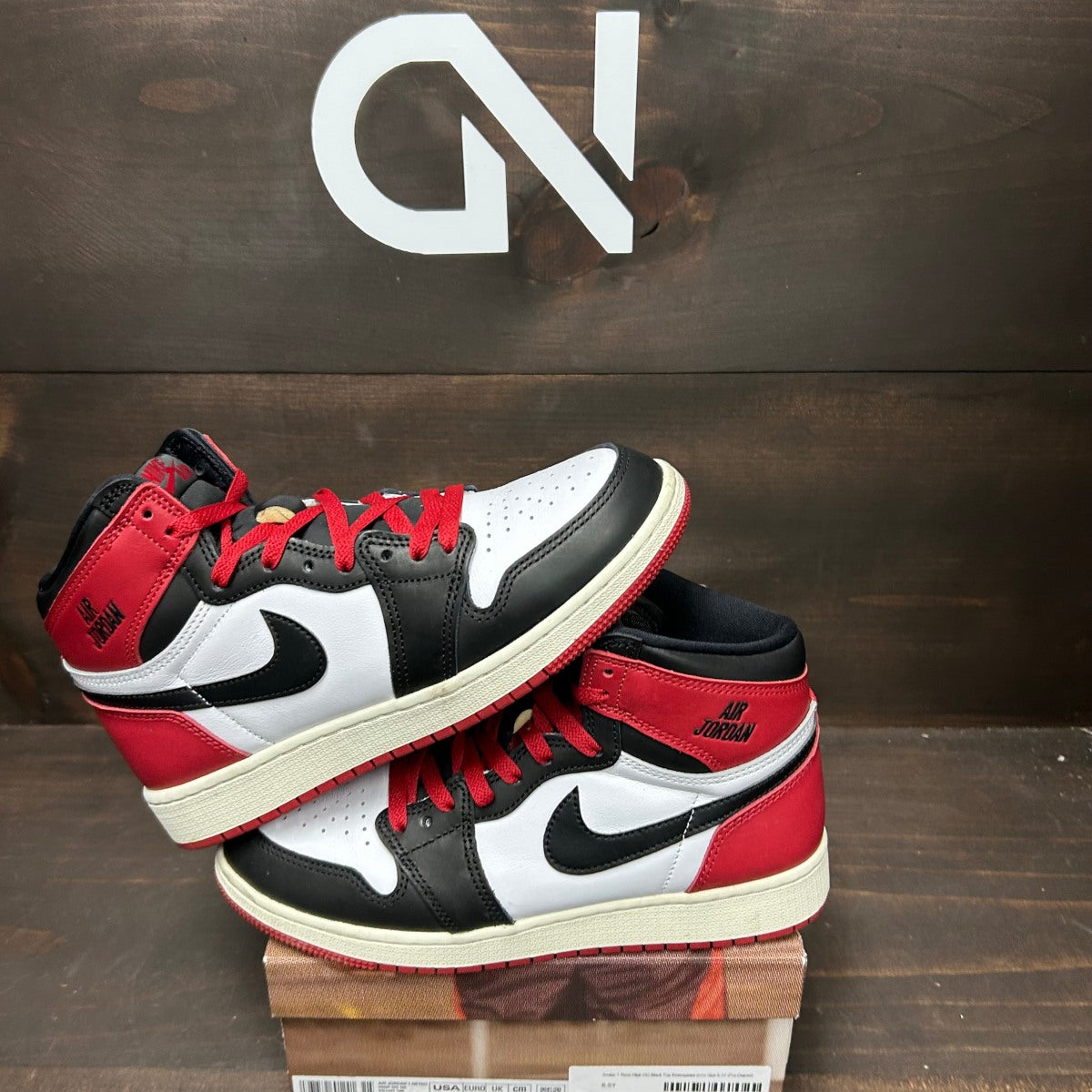 Jordan 1 Retro High OG Black Toe Reimagined (GS) - Image 1