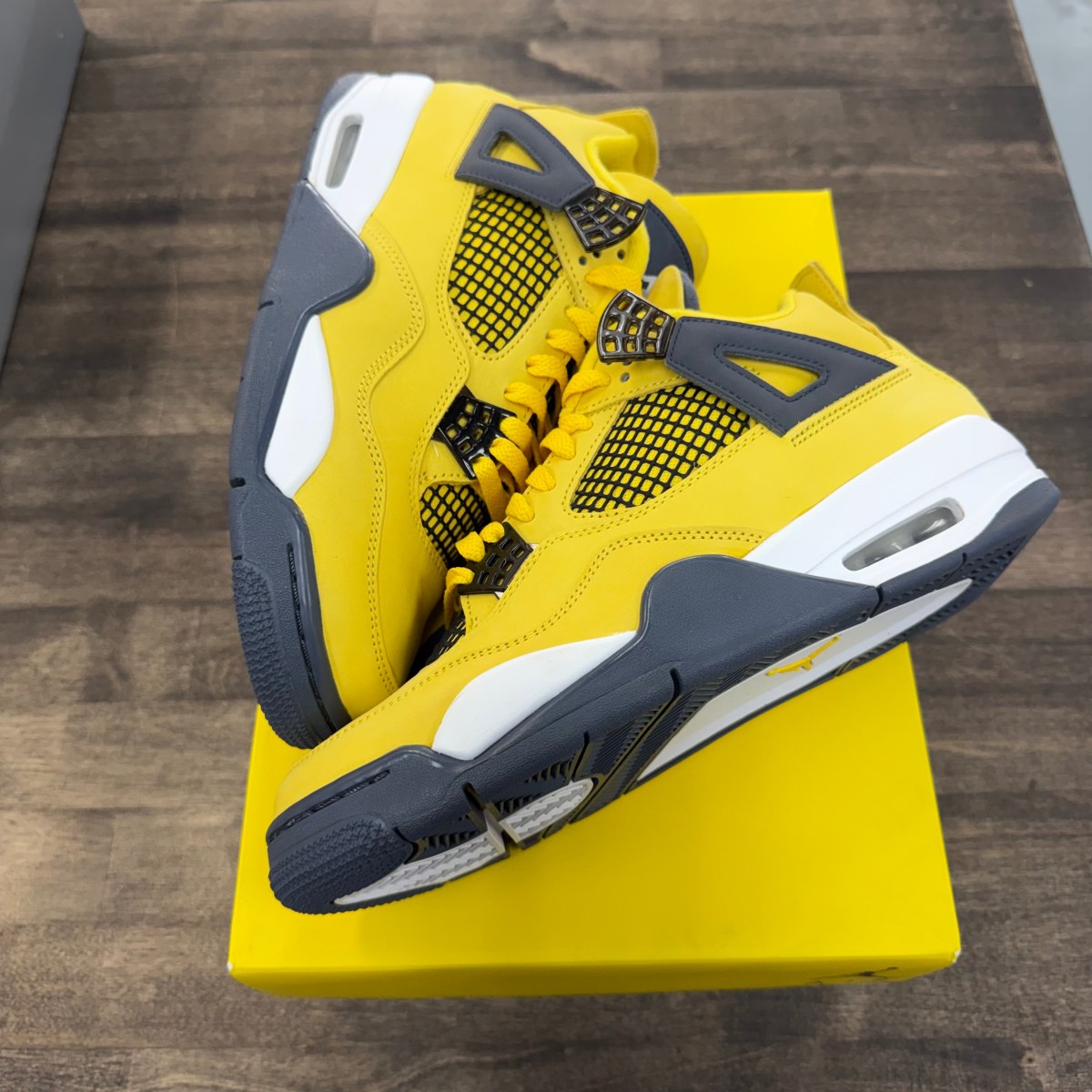 Jordan 4 Retro Lightning (2021) - Image 1
