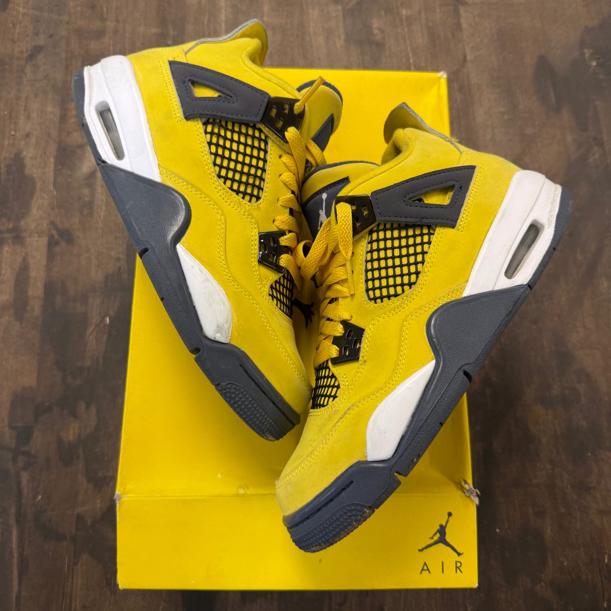 Jordan 4 Retro Lightning (2021) (GS) - Image 1