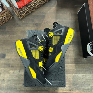 Jordan 4 Retro Thunder (2023) - Image 1
