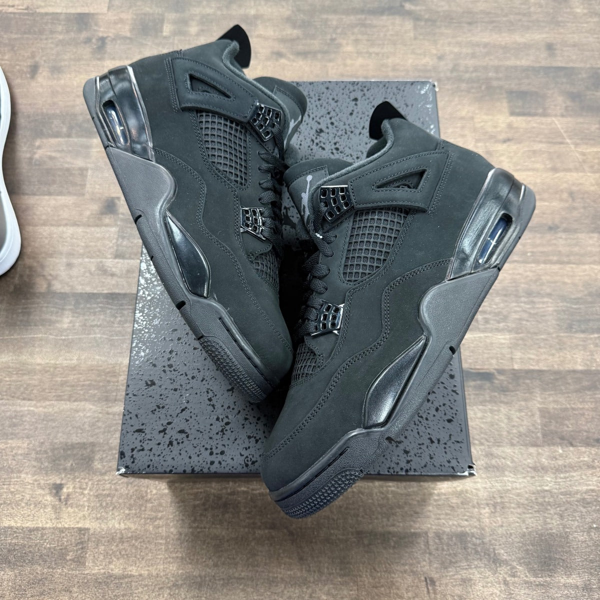 Jordan 4 Retro Black Cat (2025) - Image 1