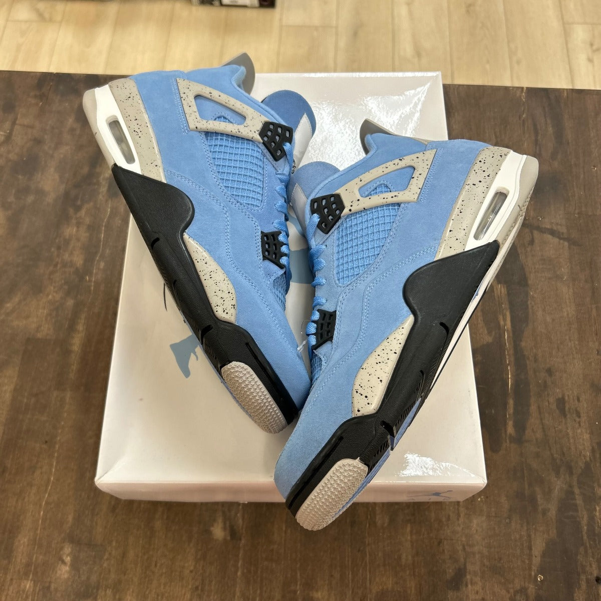 Jordan 4 Retro University Blue - Image 1