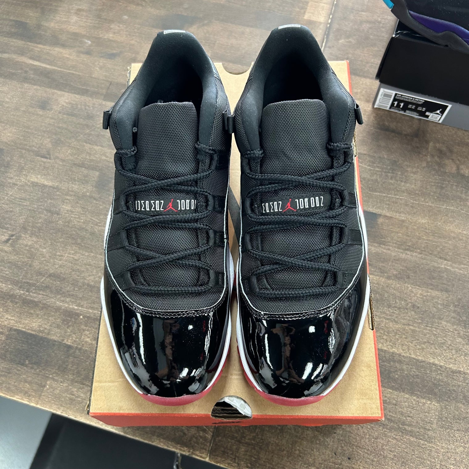 Bred Jordan 11 Retro Low (2025) (USED)