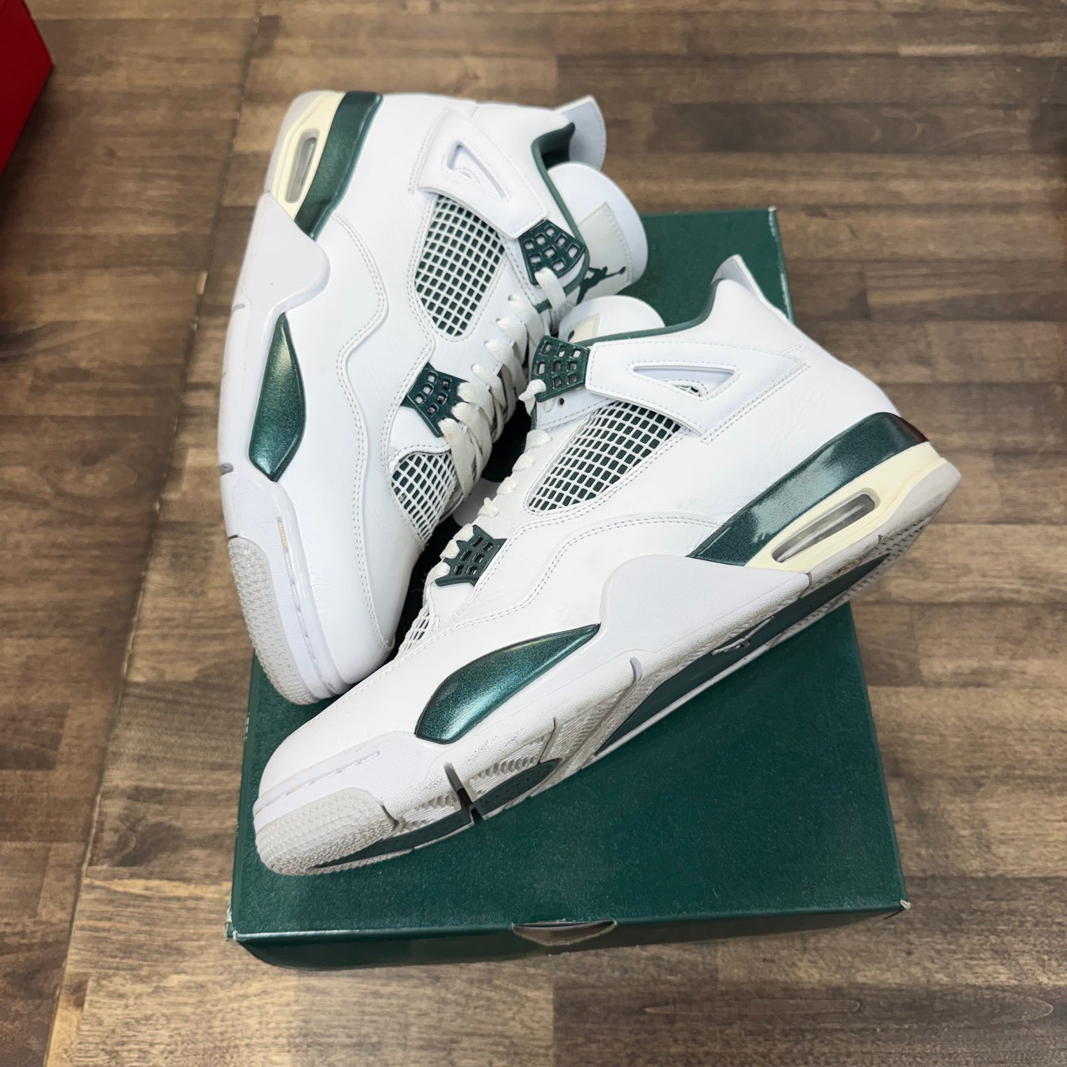 Oxidized Green Jordan 4 Retro (USED)