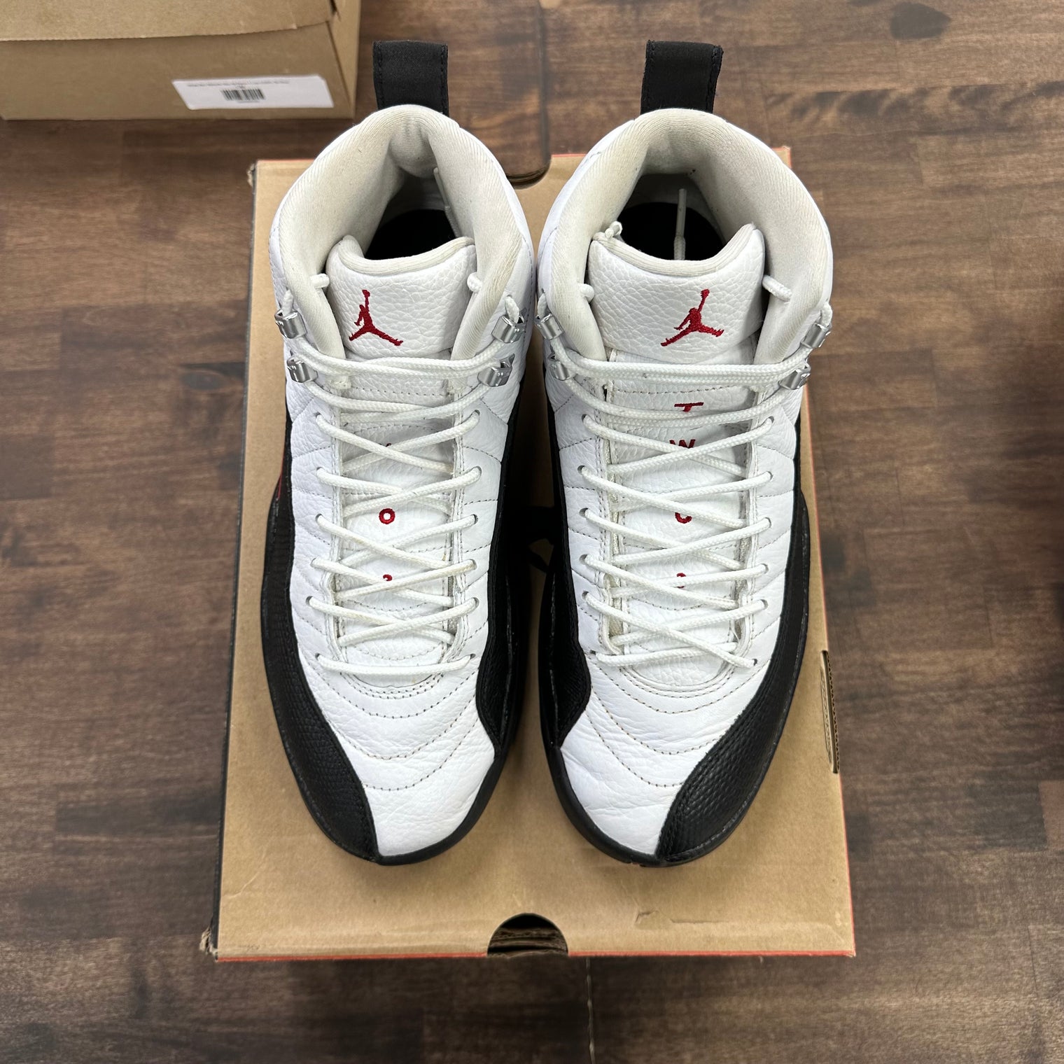 Taxi Flip Jordan 12 Retro (USED)