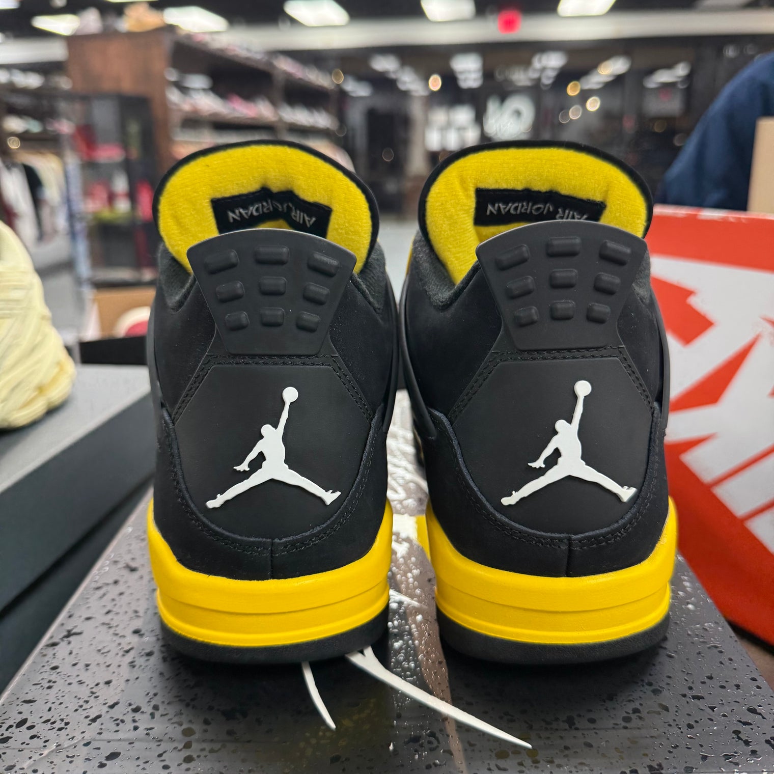 Thunder Jordan 4 Retro (Lightly Worn)