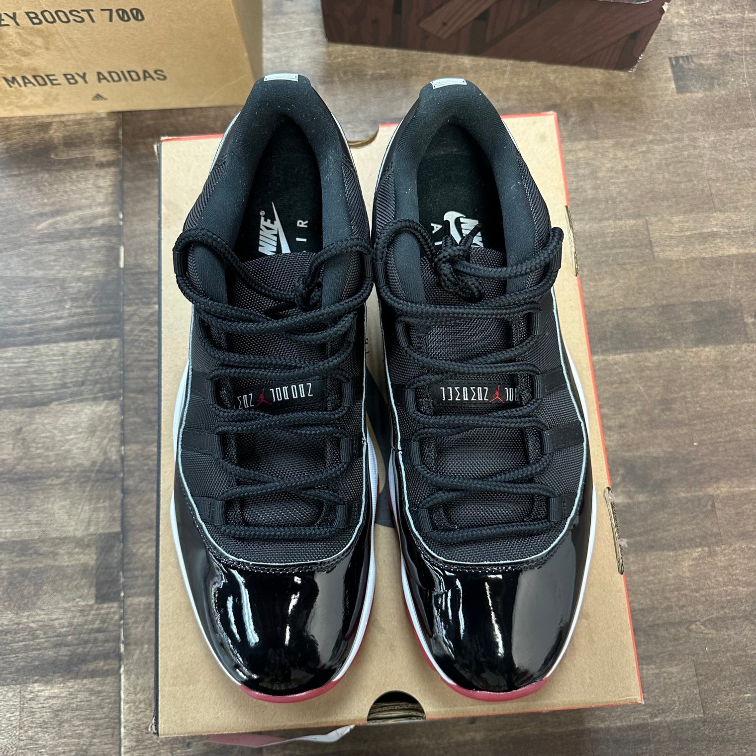 Bred Jordan 11 Retro Low (2025) (Lightly Worn)