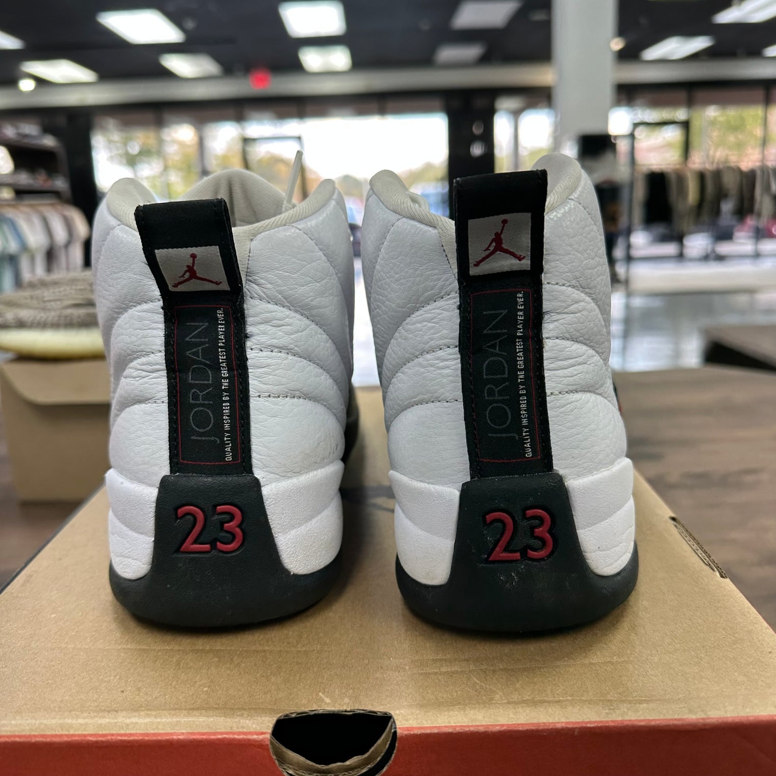 Taxi Flip Jordan 12 Retro (USED)