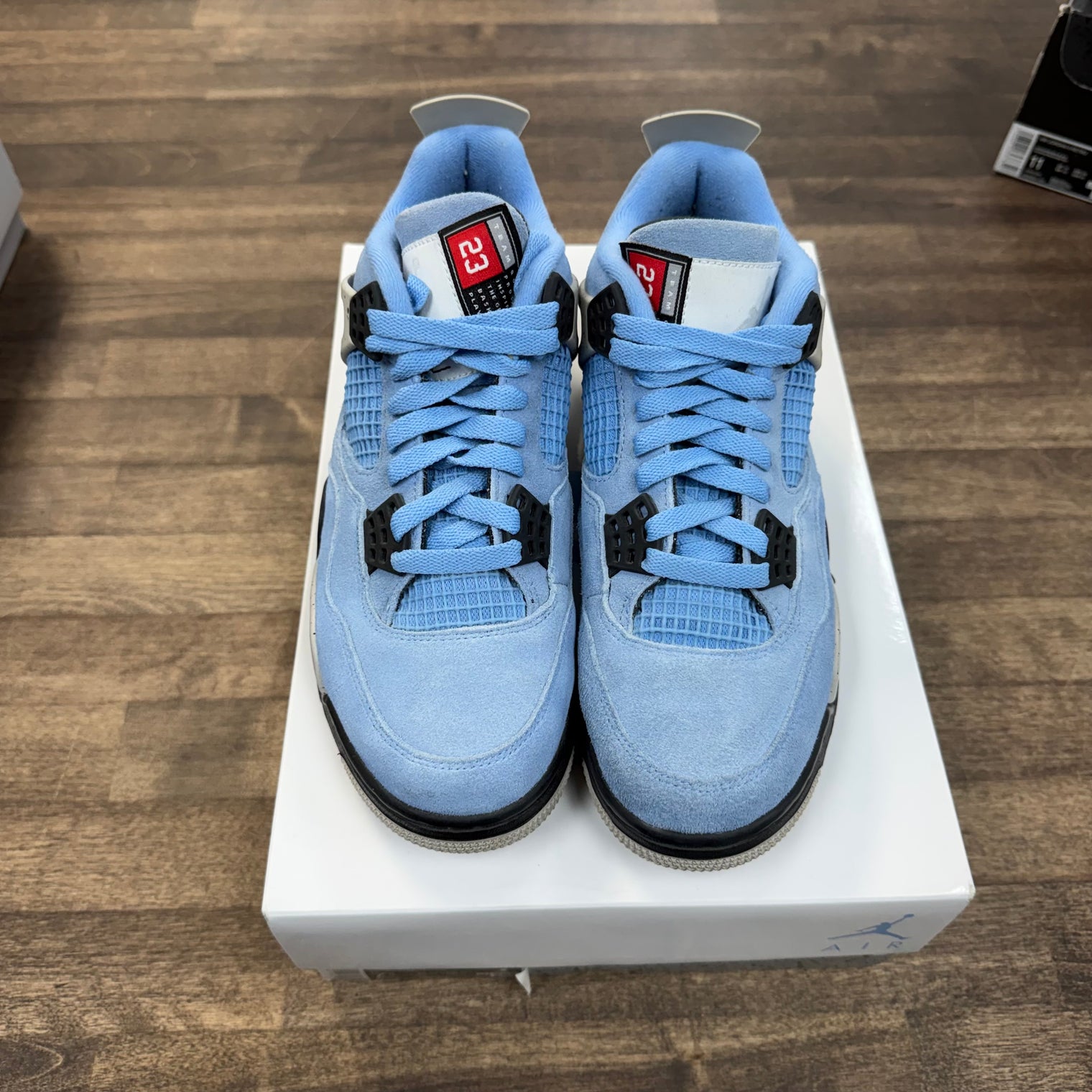 University Blue Jordan 4 Retro (USED)