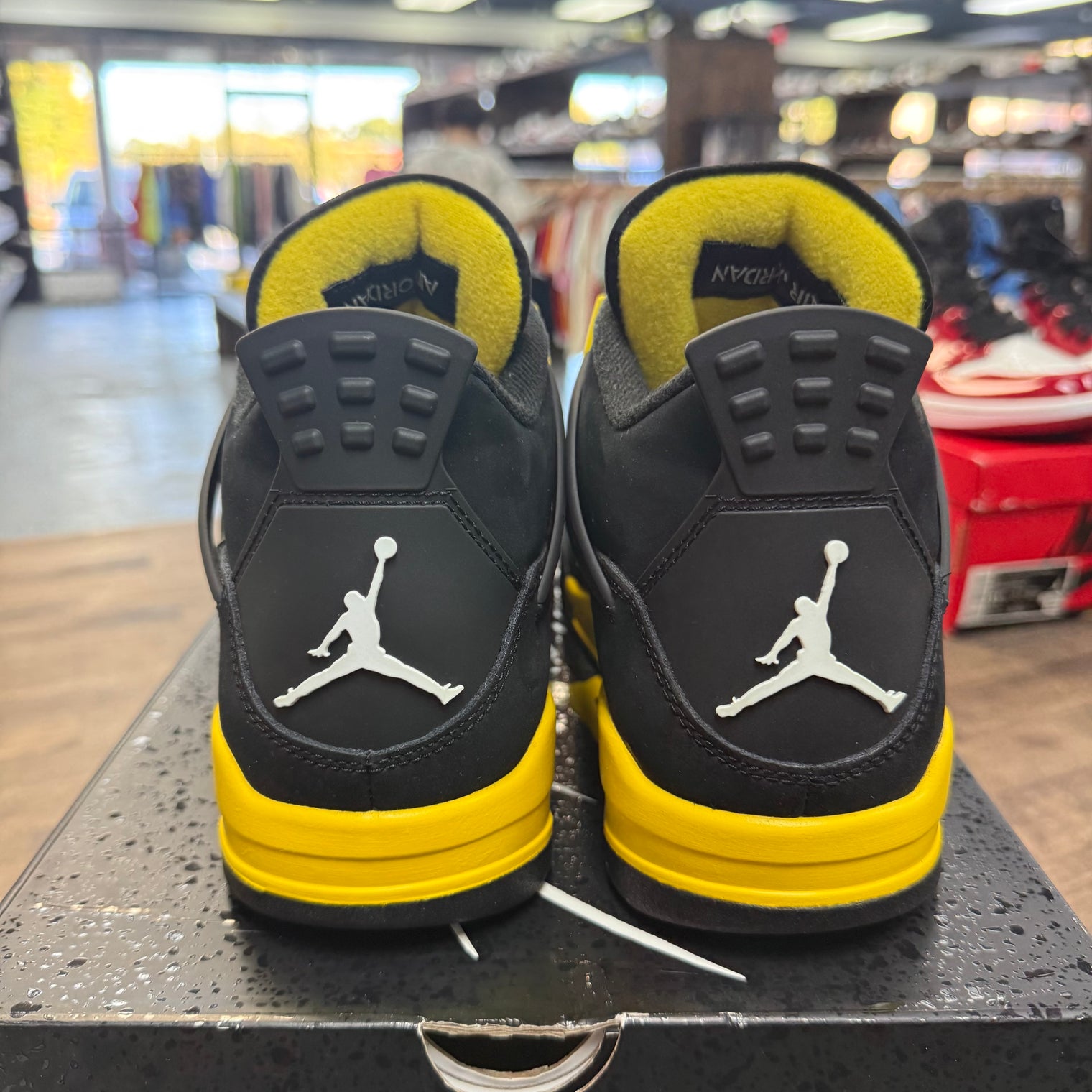 Yellow Thunder Jordan 4 Retro (USED)