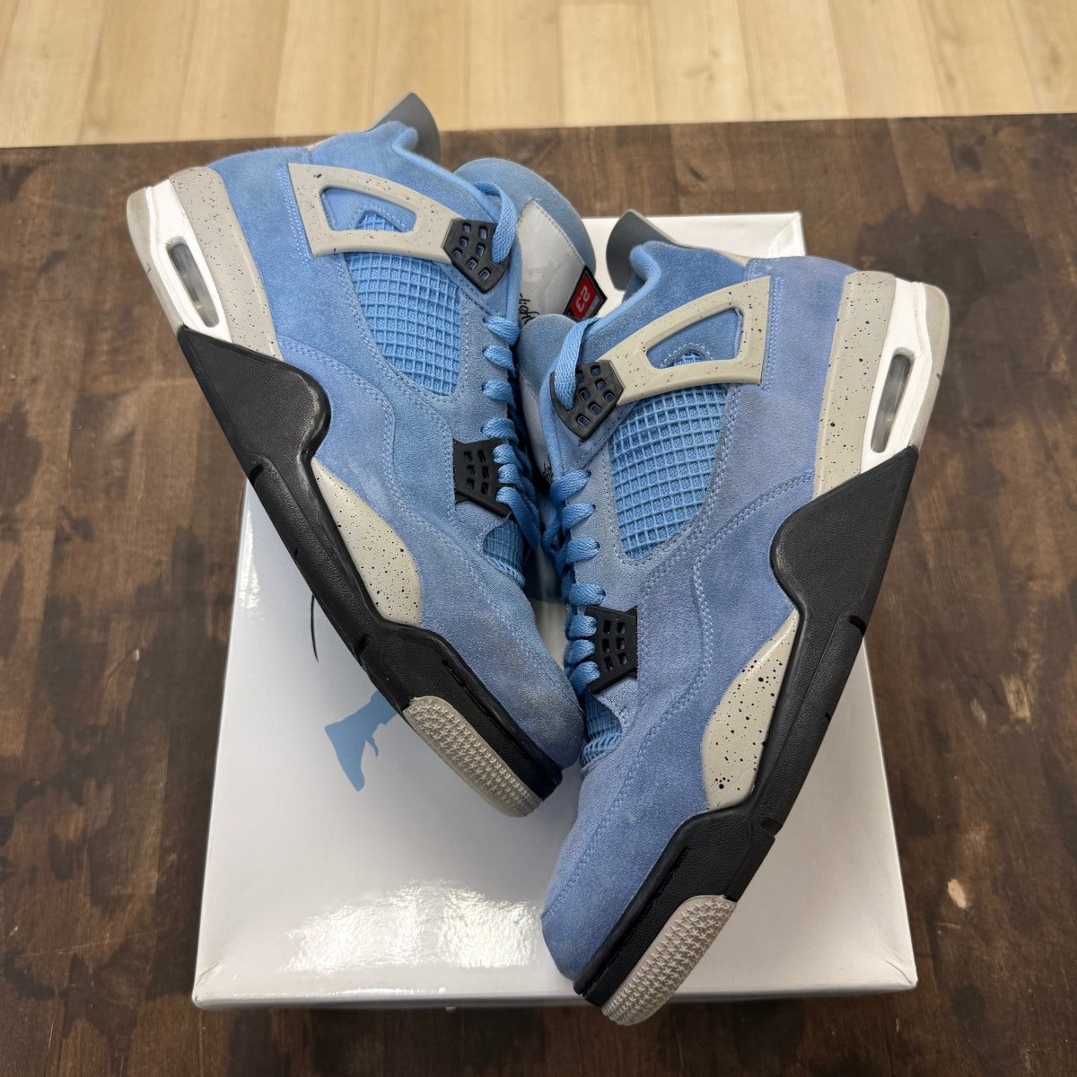 Jordan 4 Retro University Blue - Image 1