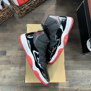 Jordan 11 Retro Playoffs Bred (2019) - Image 1