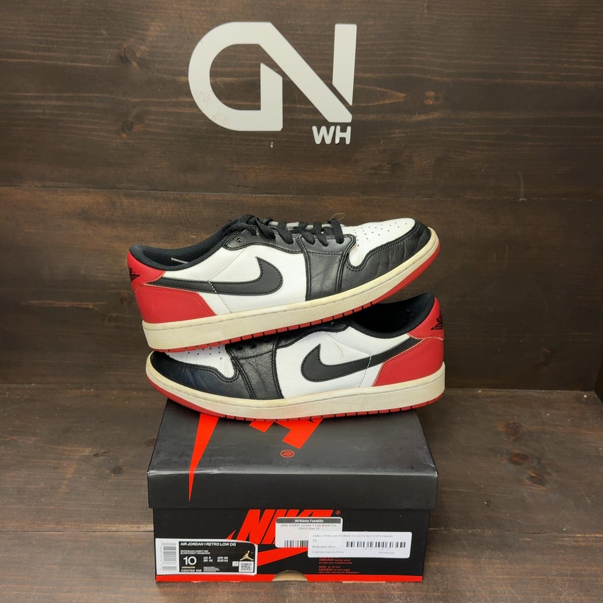 Jordan 1 Retro Low OG Black Toe (2023) Size 10 (Pre-Owned) - front