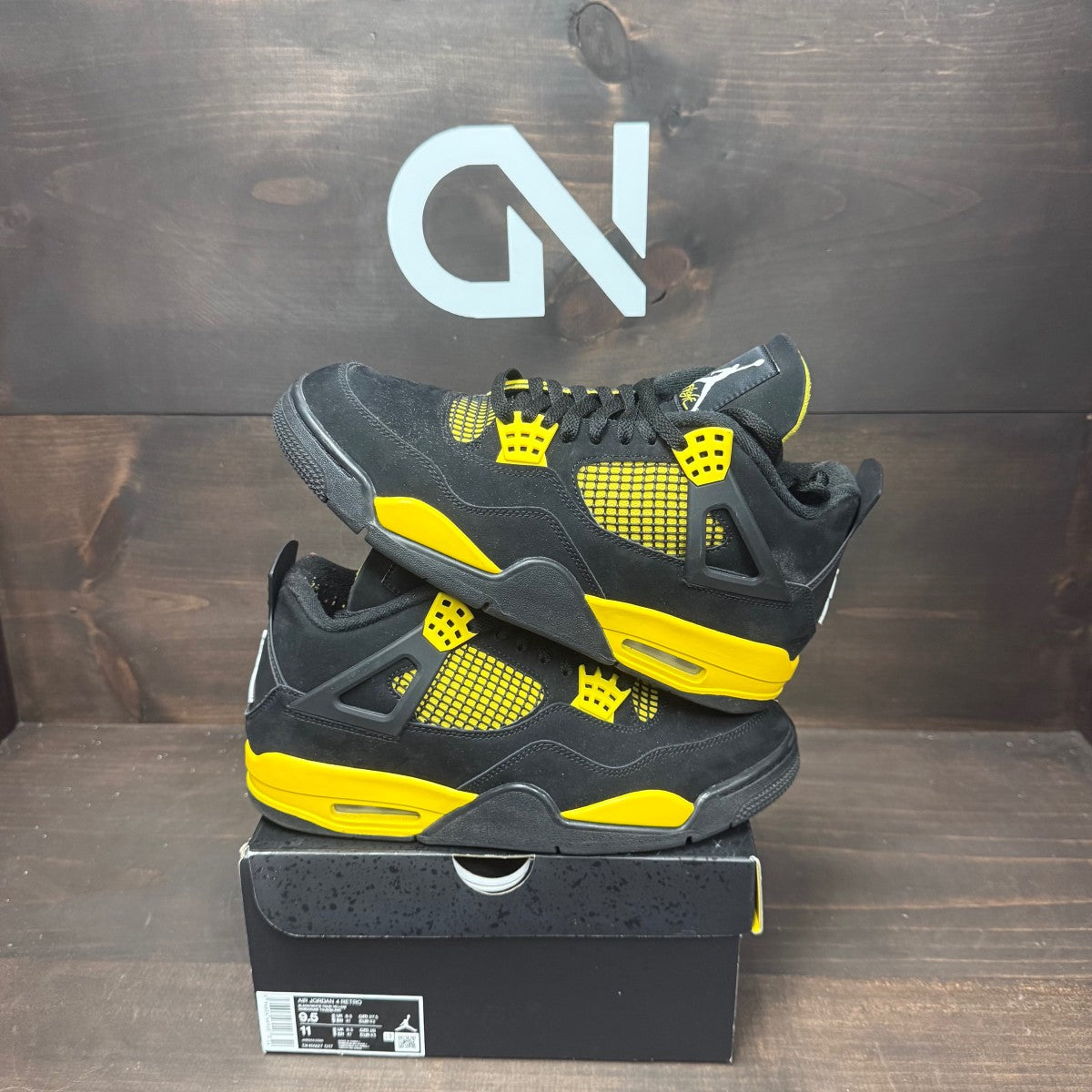 Jordan 4 Retro Thunder (2023) - Image 1