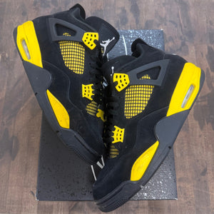 Jordan 4 Retro Thunder (2023) - Image 1