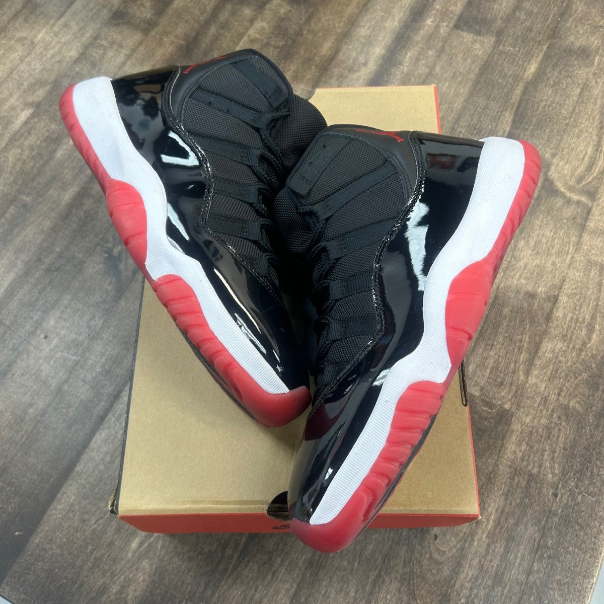 Jordan 11 Retro Playoffs Bred (2019) Size 9.5 (Pre-Owned) - Image 1