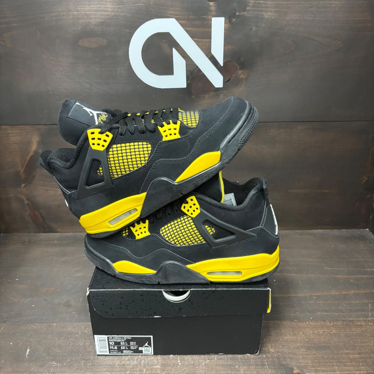 Jordan 4 Retro Thunder (2023) - Image 1