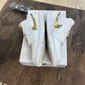 Jordan 1 Low White Metallic Gold (Women's) - Image 3