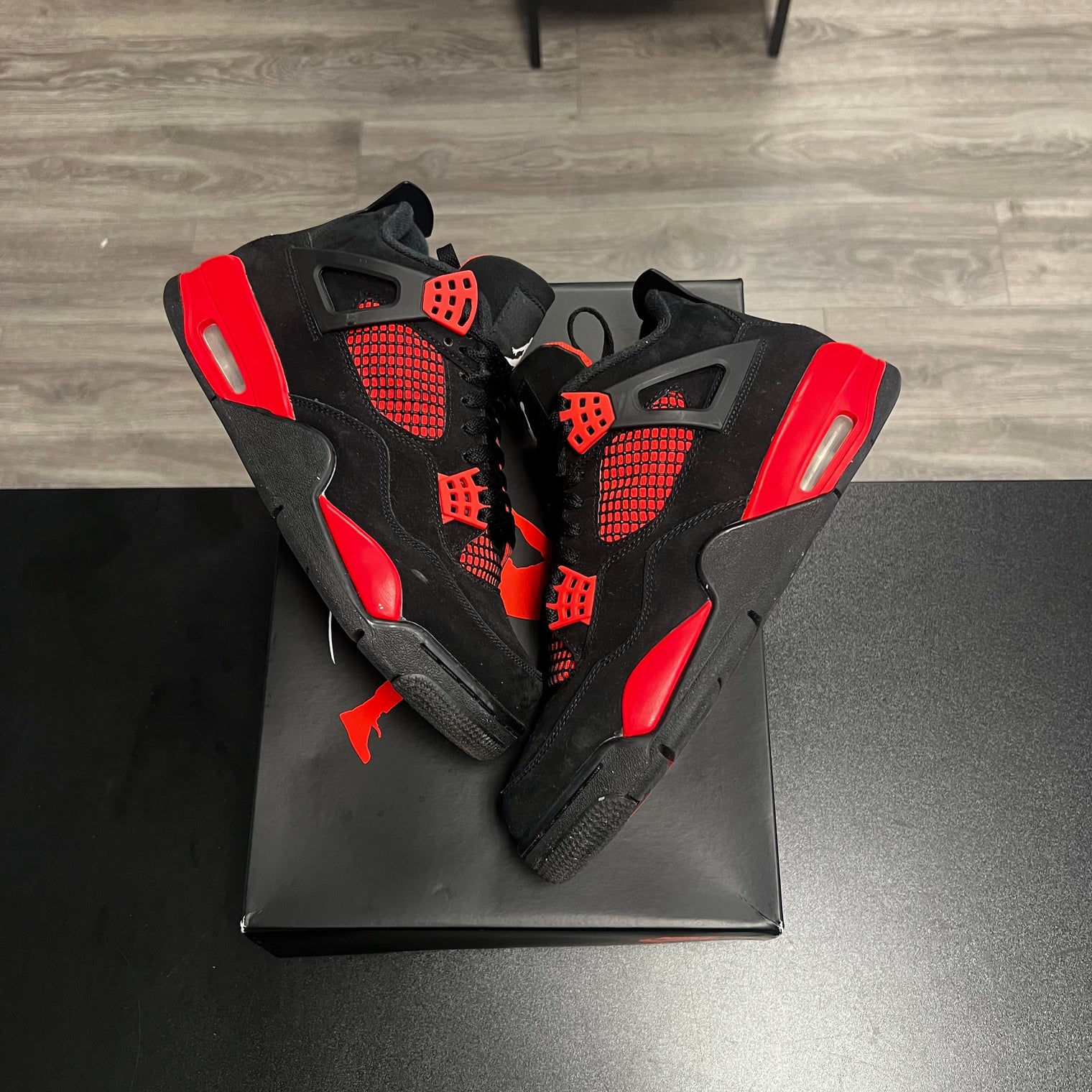 Red Thunder Jordan 4 (USED)