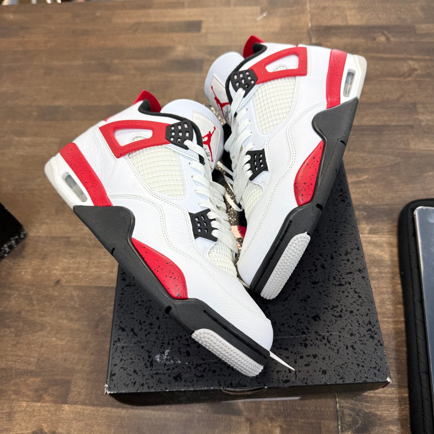 Red Cement Jordan 4 (USED)