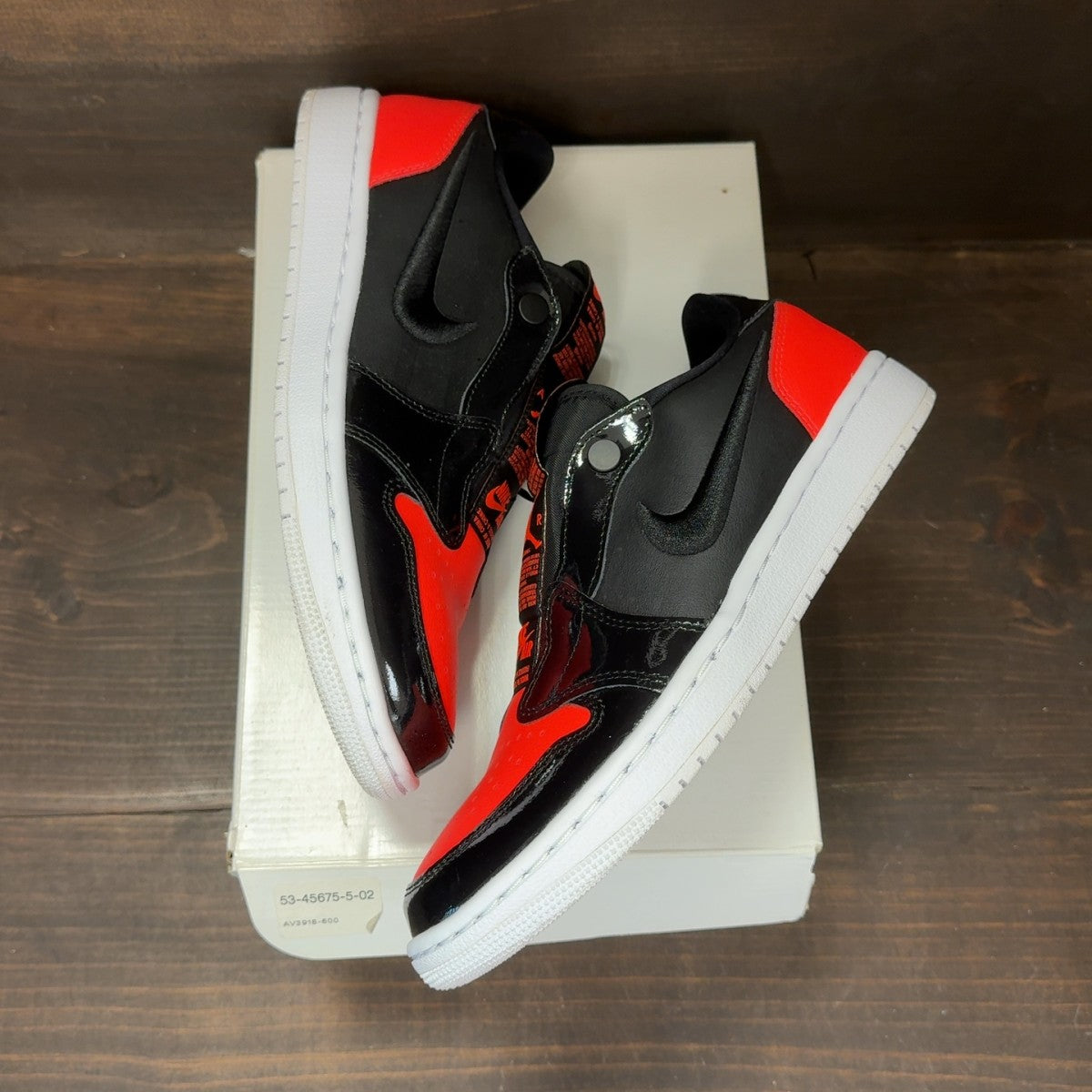 Jordan 1 Low Slip Black Hot Punch (Women's) - Image 2