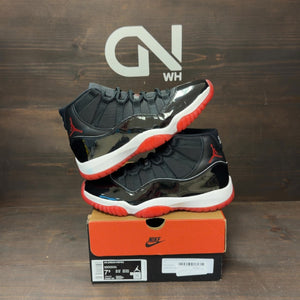 Jordan 11 Retro Playoffs Bred (2019) - Image 1