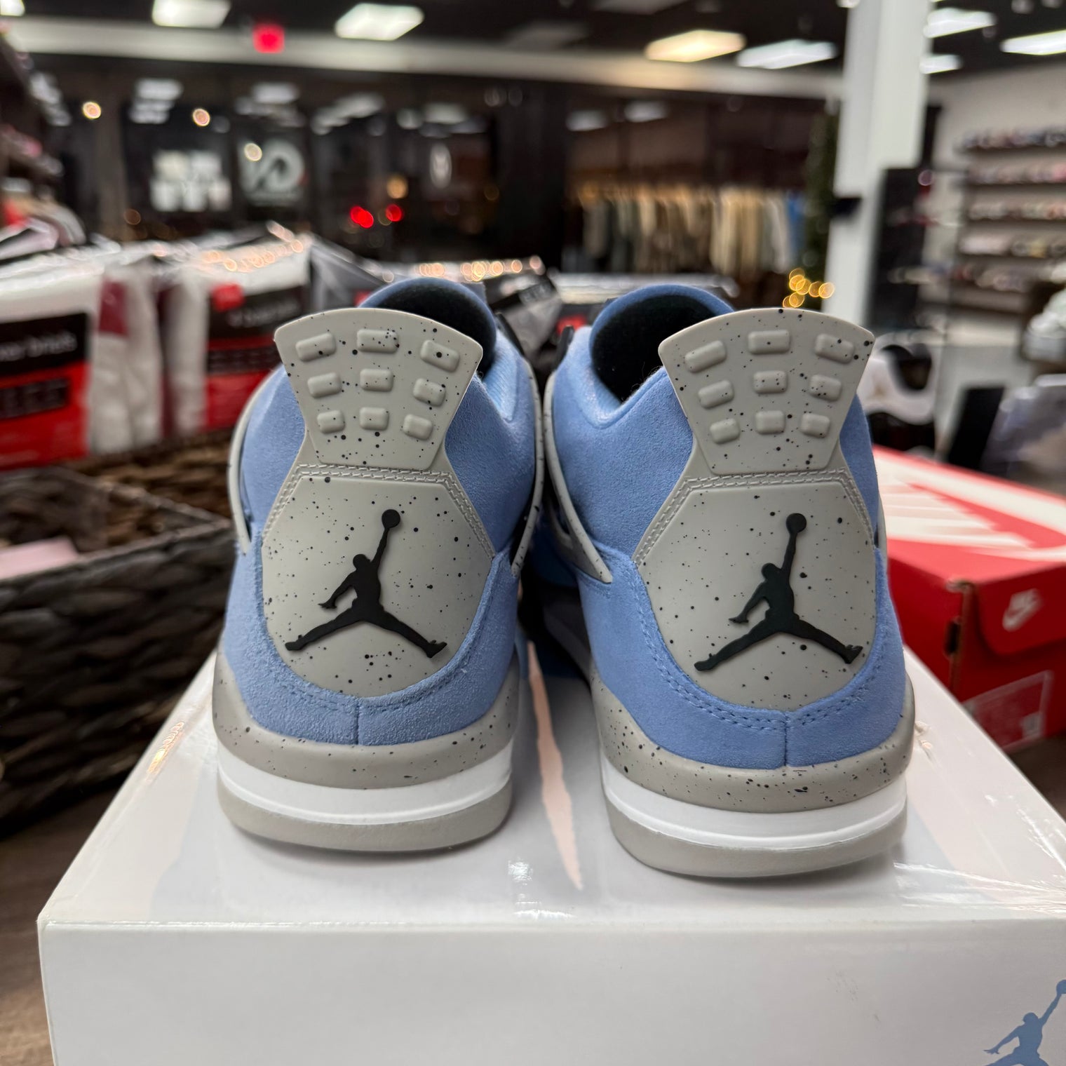 University Blue Jordan 4 Retro (Lightly Worn)