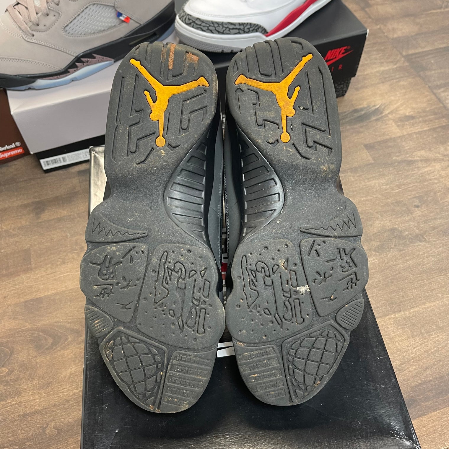 University Gold Dark Charcoal Jordan 9 Retro (USED)
